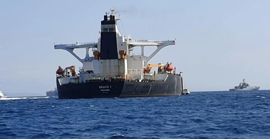 Oil slides below $100