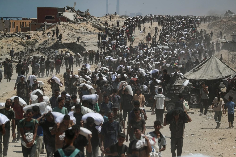 Israel announces daily pauses in Gaza fighting as aid airdrops begin