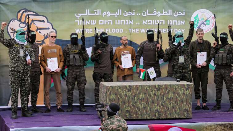 Hamas frees three hostages, Israel begins releasing Palestinians