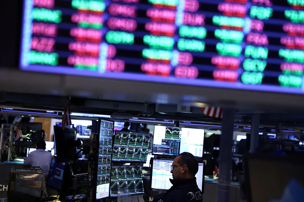 Oil tops $100, dollar gains, stocks fall as US moves to blockade Iran