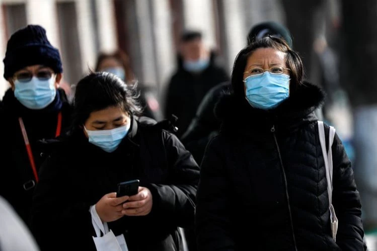 China disease expert says COVID-19 origins probe should shift to US