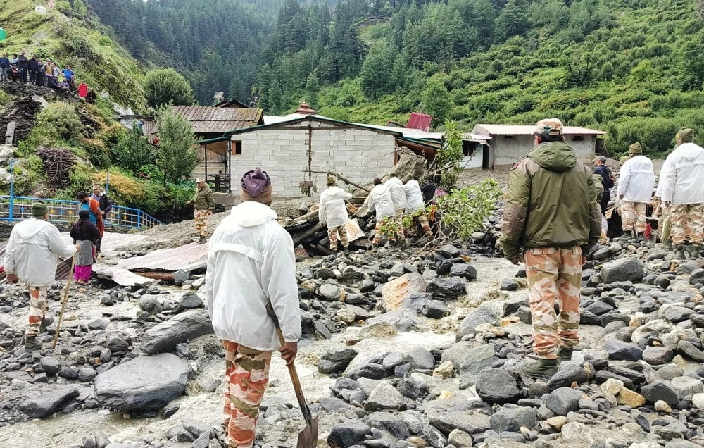Helicopters rescue people stranded by flooding in Himalayan state