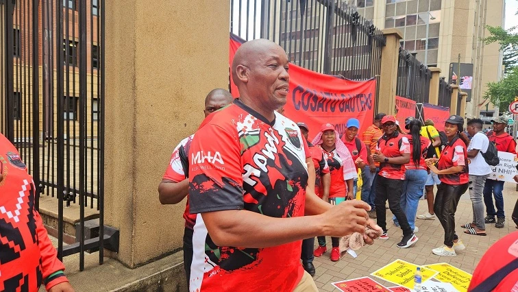 Pro-NHI groups rally outside court as legal battle continues
