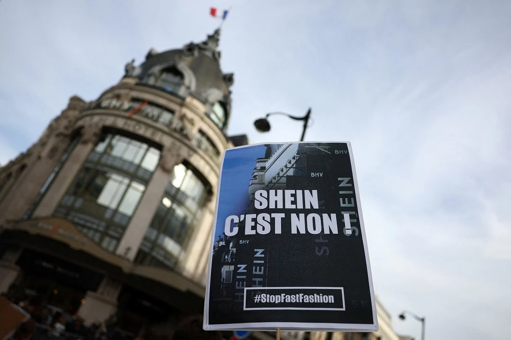 Shein store opening in Paris draws protesters, police and bargain hunters