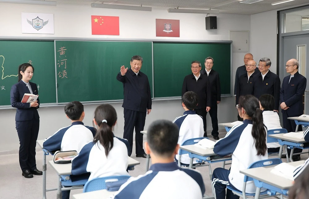 China announces policy to ease academic pressure on students
