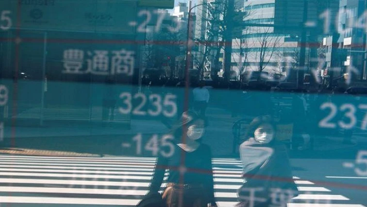 Asian stocks hold vaccine-driven gains after US defensive shift