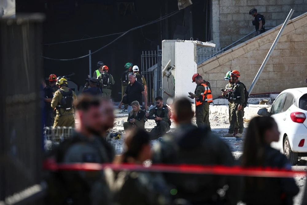 Israeli scientists try to save work after Iranian missile hits labs