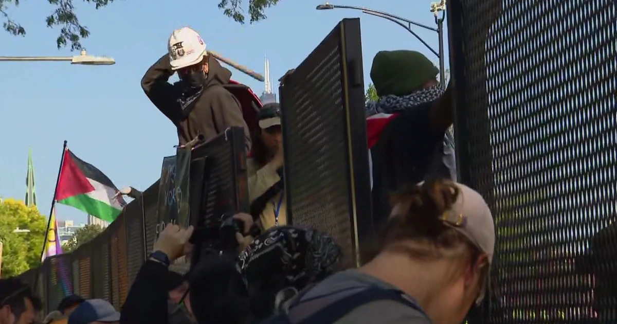 Police arrested 13 people during first day of DNC; security fence fortified