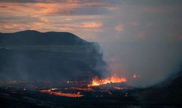 Stay away! Iceland volcano erupts 20 miles from airport as onlookers urged to avoid area