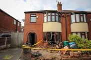 Front of home destroyed as car smashes through window during 'police chase'