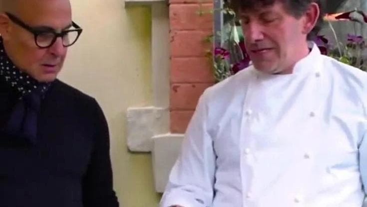 Milano, Stanley Tucci a lezione di pasta e fagioli da Cesare Battisti