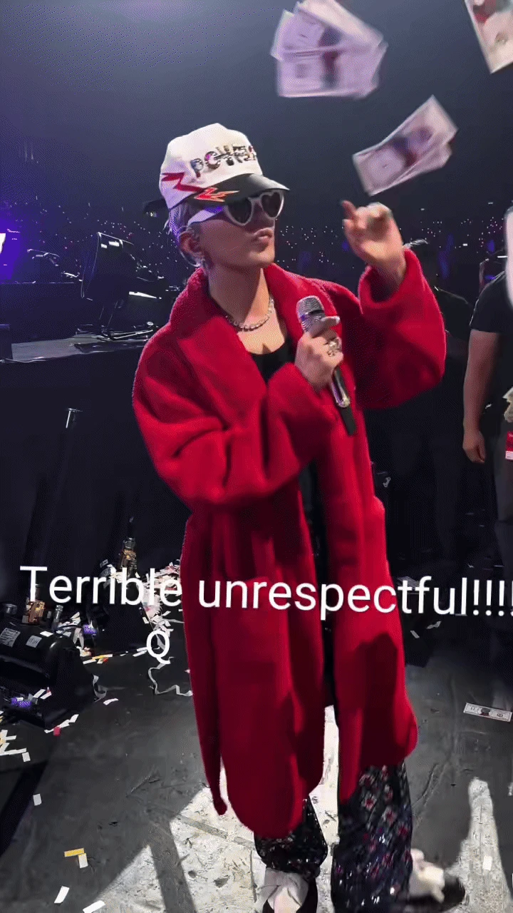 G-Dragon bị ném tiền giả vào mặt để mua vui, ý nghĩa đằng sau còn đen tối hơn thế?