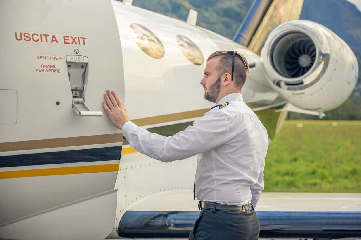 Flight passengers' ritual of touching airplane before boarding sparks mixed feelings among travelers