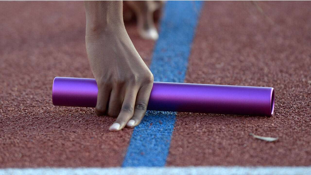 Teen athlete who bashed opponent's head with baton claims it was accidental as she cries over backlash