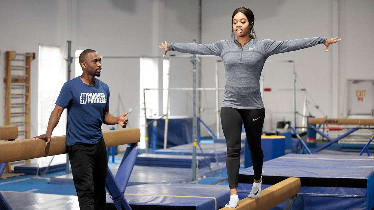 Olympian Gabby Douglas 'crushed' her gymnastics return was put on hold after positive COVID test