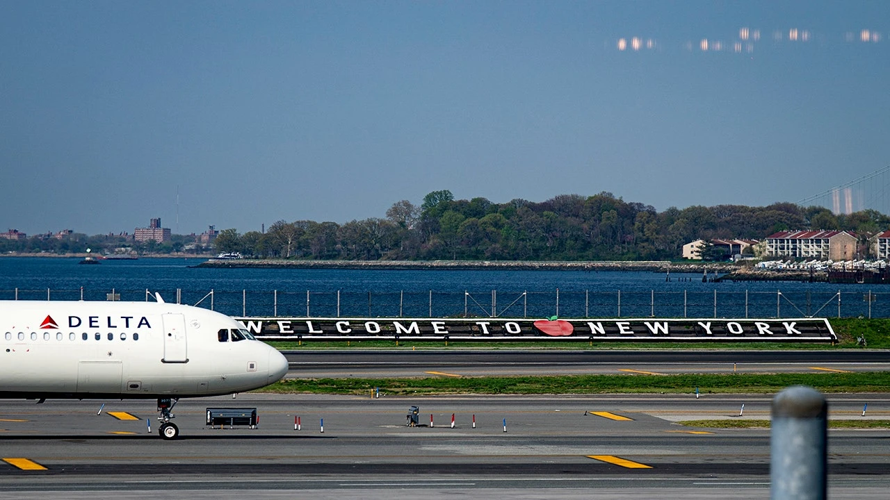 LaGuardia Airport AI hologram answers traveler questions