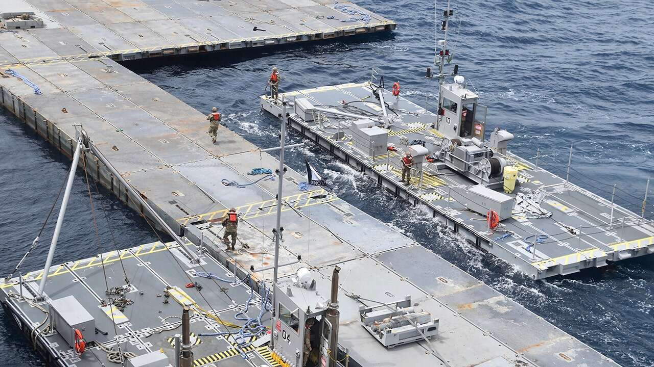 US military constructs hulking metal pier amid Biden's $320 million gamble to get aid into Gaza