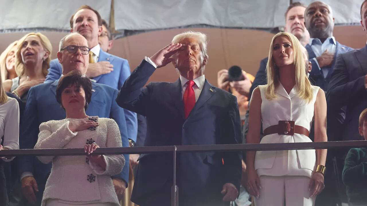 Trump receives raucous reception as he salutes during Super Bowl LIX national anthem