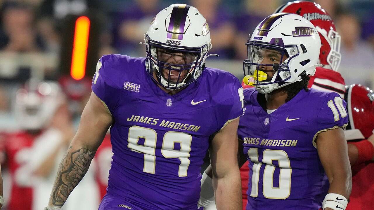 James Madison football star empties the quiver in celebration during bowl game win