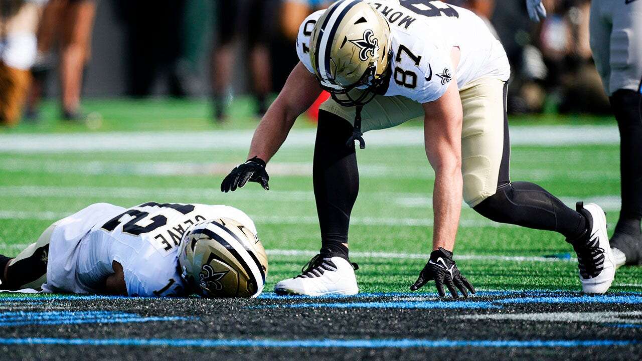 Saints' Chris Olave takes crushing hit vs Panthers, stretchered off the field