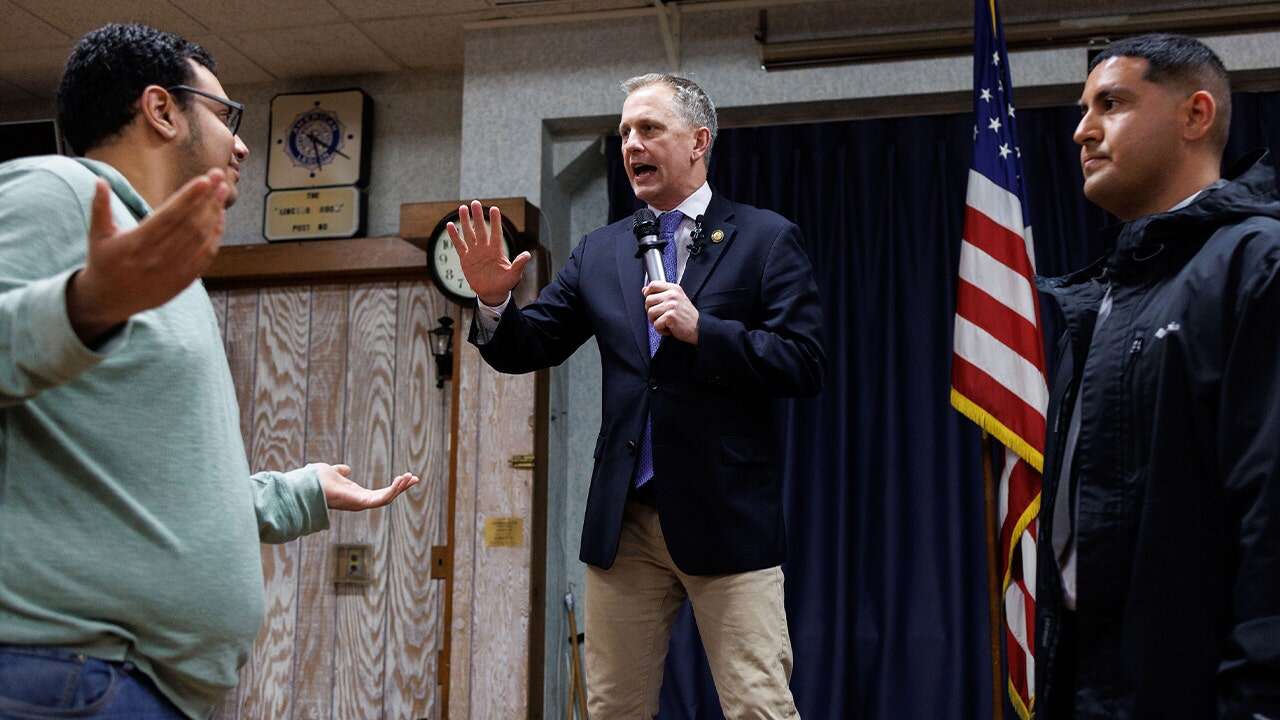 'Soulless piece of crap': Angry protester jumps on stage during Dem rep's town hall