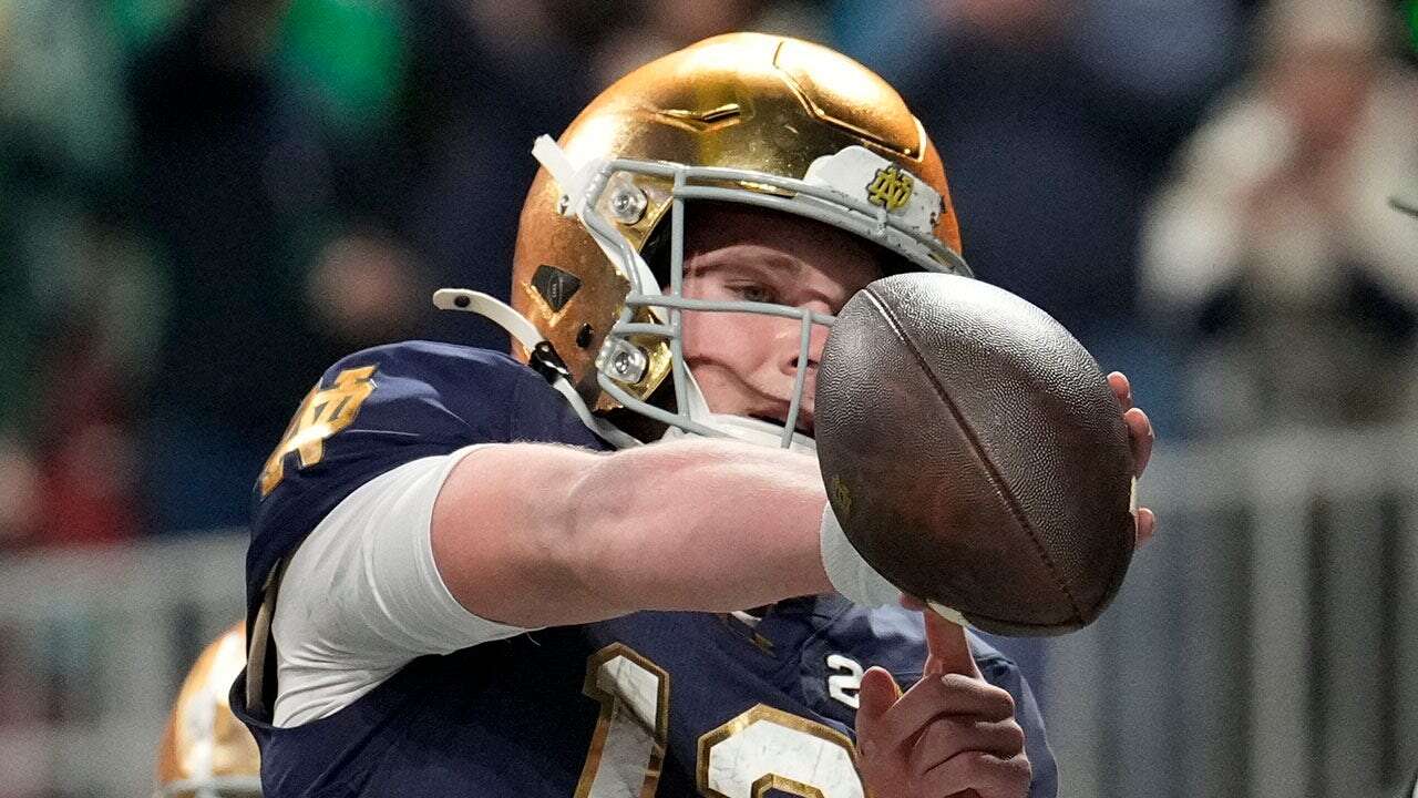 Notre Dame's Riley Leonard points to favorite Bible verse after scoring opening TD in national title game