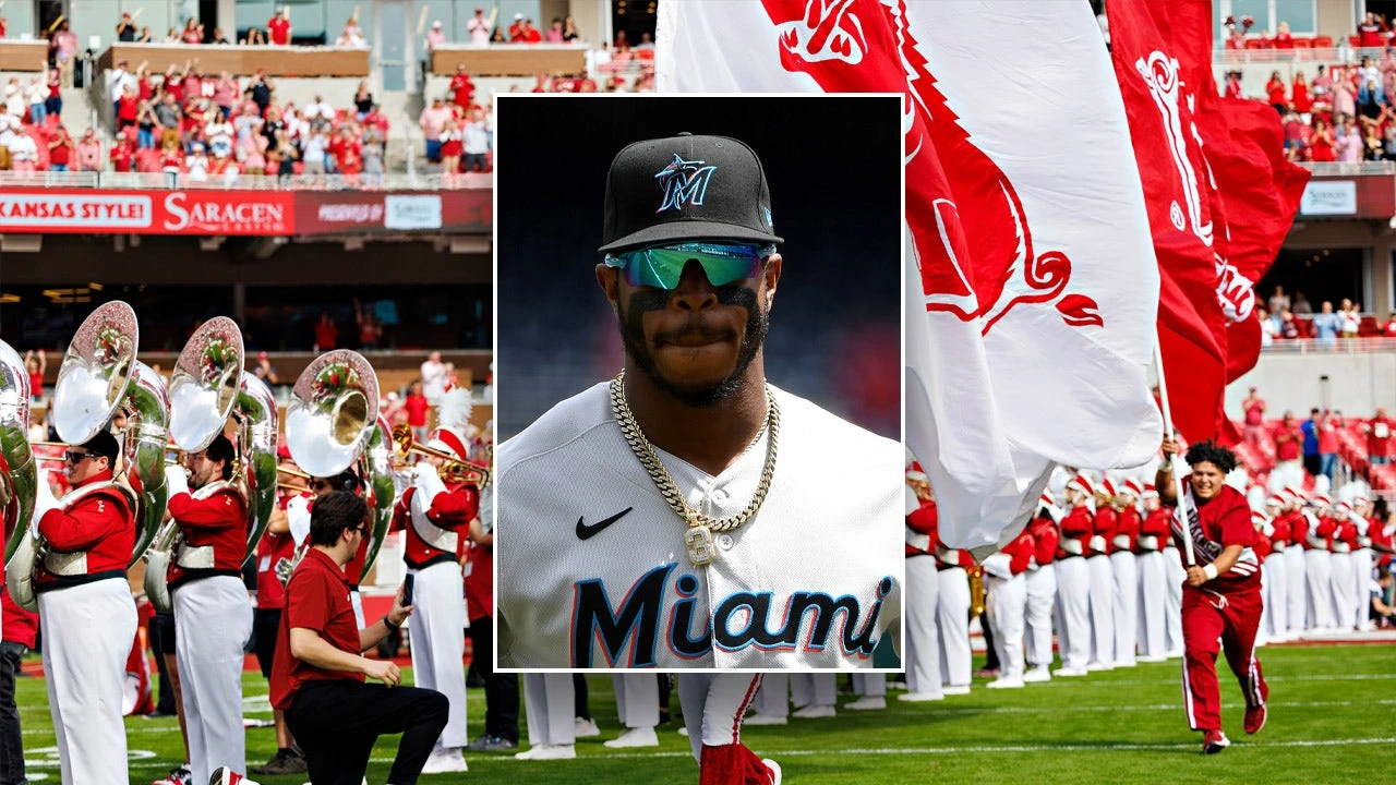 Ex-MLB player Monte Harrison, 28, to play football at Arkansas next season