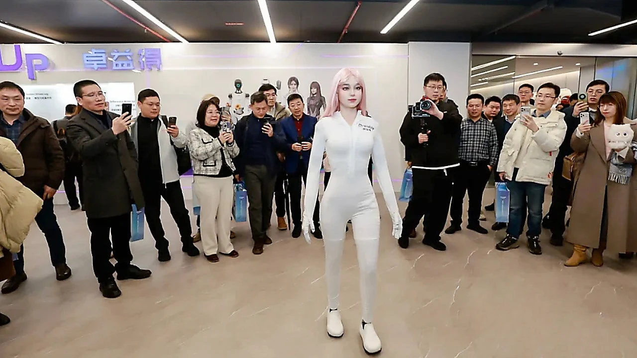 Warm-skinned AI robot with camera eyes is seriously creepy