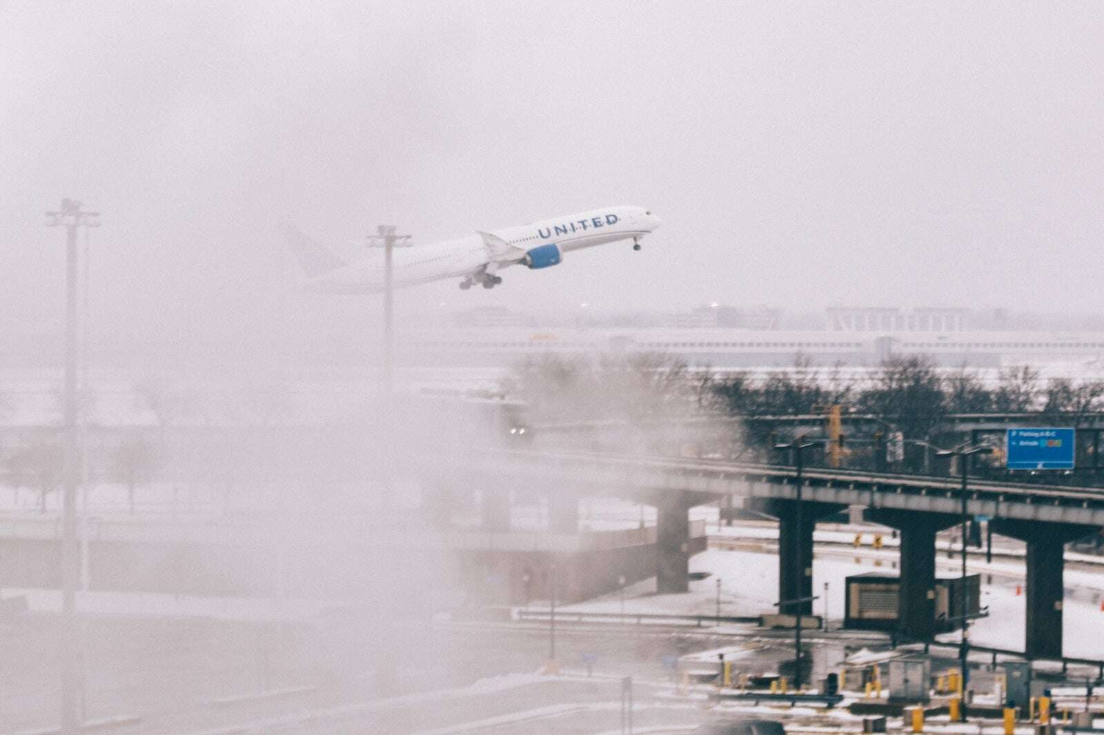 Snow, ice and bitter cold disrupt travel with more than 2,000 flights canceled