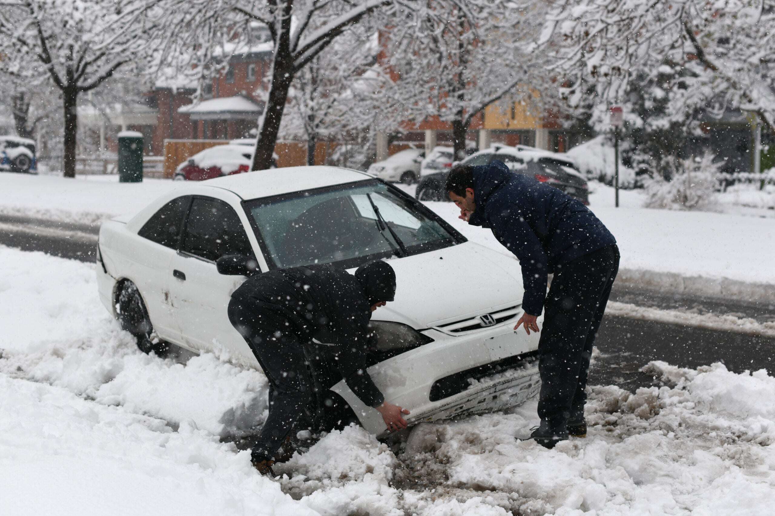 More than 800 flights canceled as late-winter storm stymies Denver