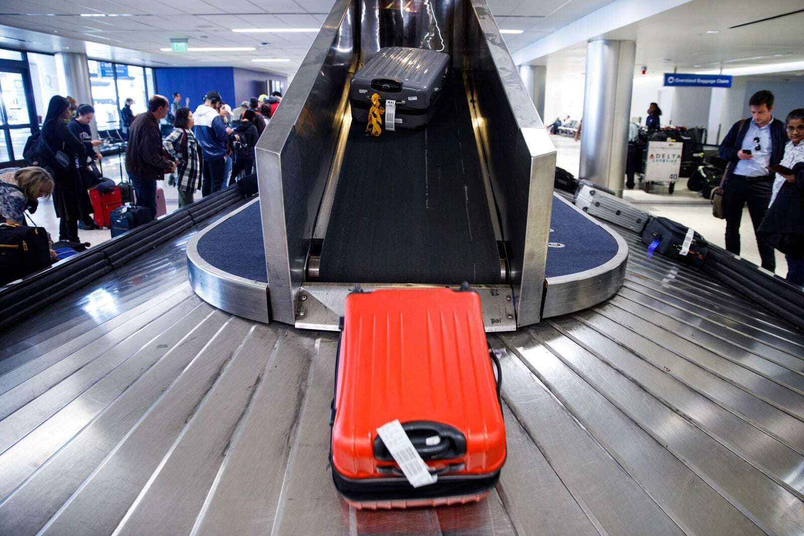 How to avoid checked baggage fees on major domestic airlines