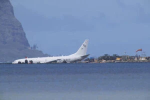 Dive teams right coral damaged by plane in Kaneohe Bay