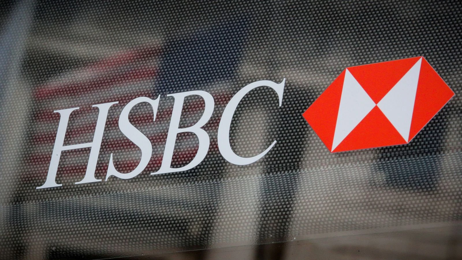 HSBC reports 35% fall in profits and warns it could start charging for current accounts