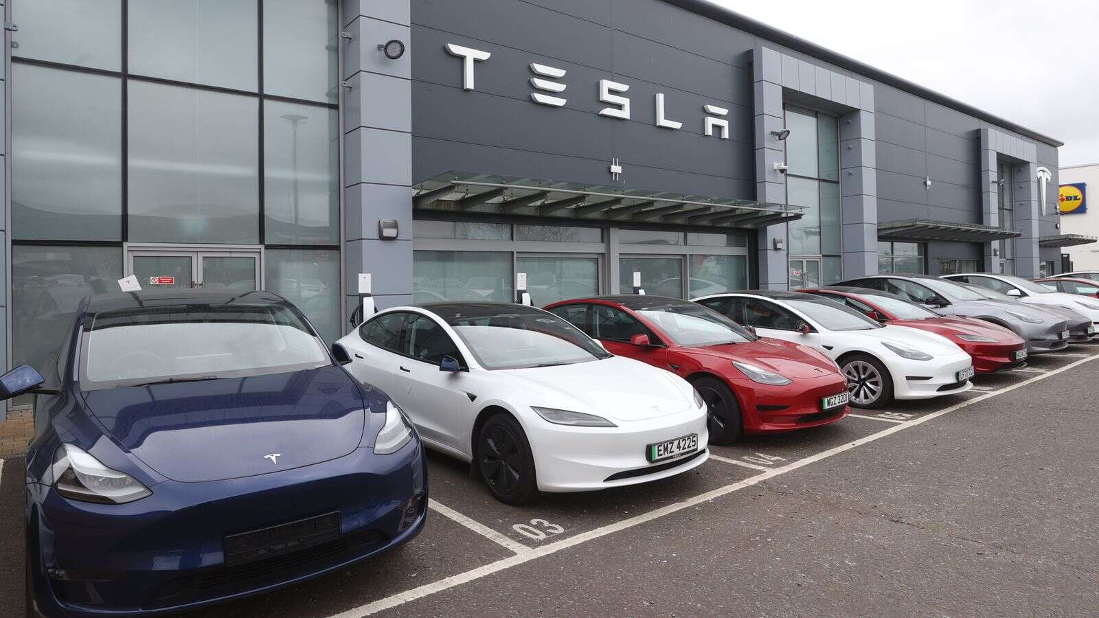 Vandals damage Tesla cars - as windows smashed and wing mirrors broken