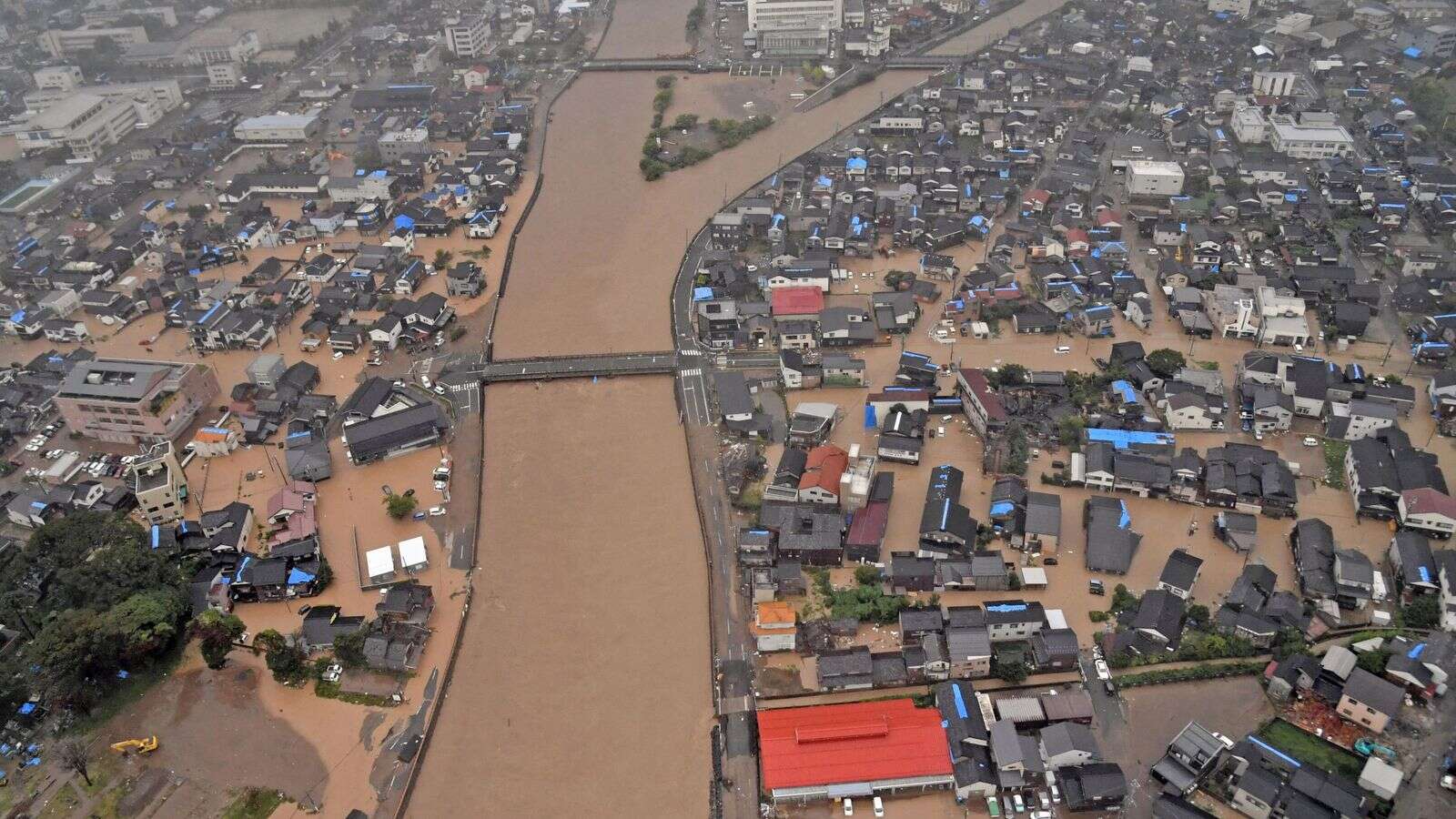 One killed and several missing in Japan as heavy rain and floods hit region