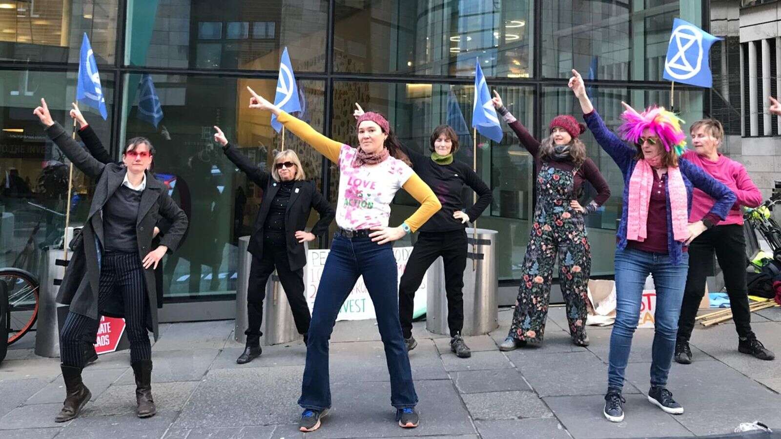 Climate activists stage protest dancing to Stayin' Alive by Bee Gees