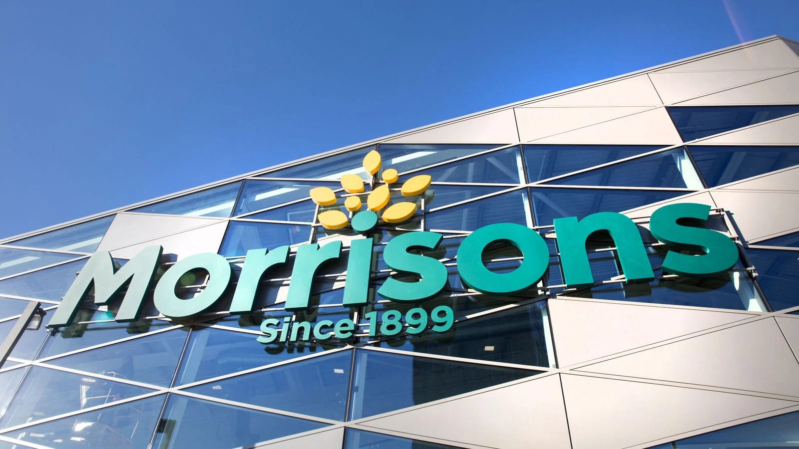 Morrisons defends pay policy after investor revolt rejects bonus Potts