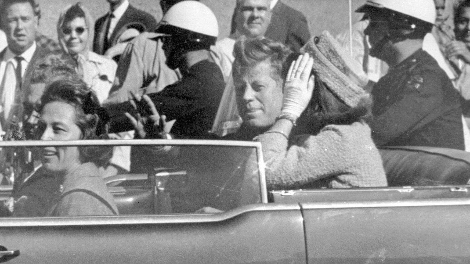 What are the conspiracy theories about JFK's assassination?