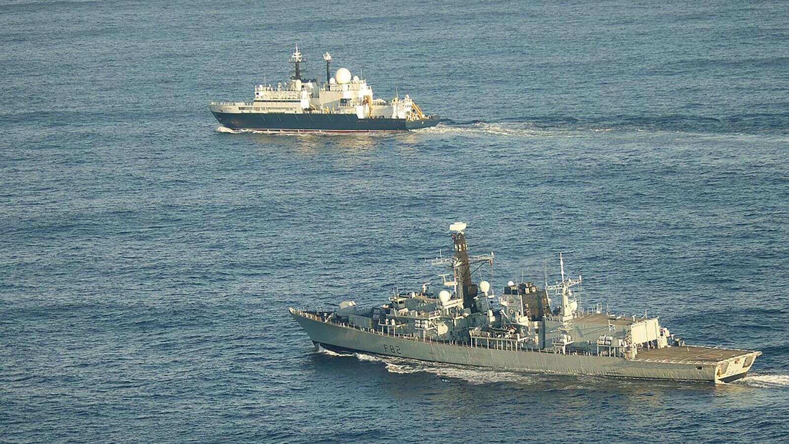 Putin warned after Royal Navy tracks 'spy' ship that entered UK waters for second time in months