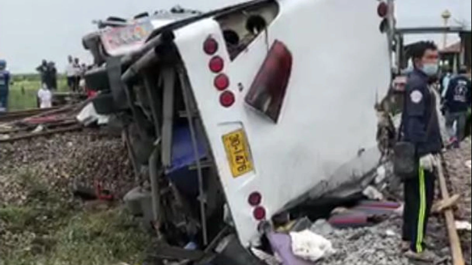 At least 17 people die after train collides with bus in Thailand