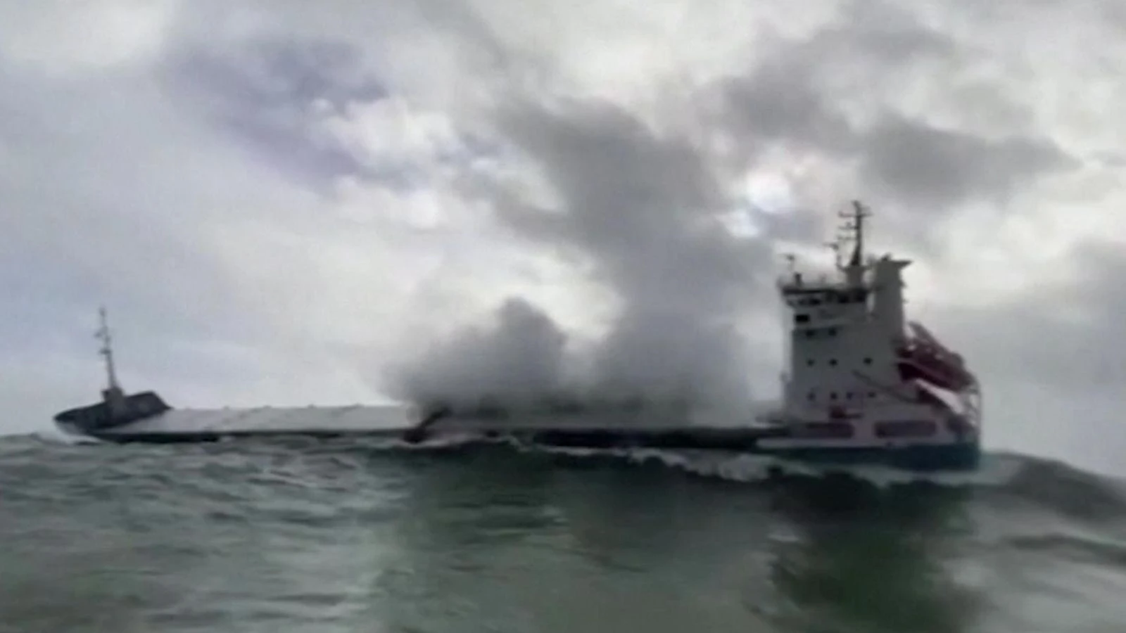Crew rescued after ship trapped in huge waves