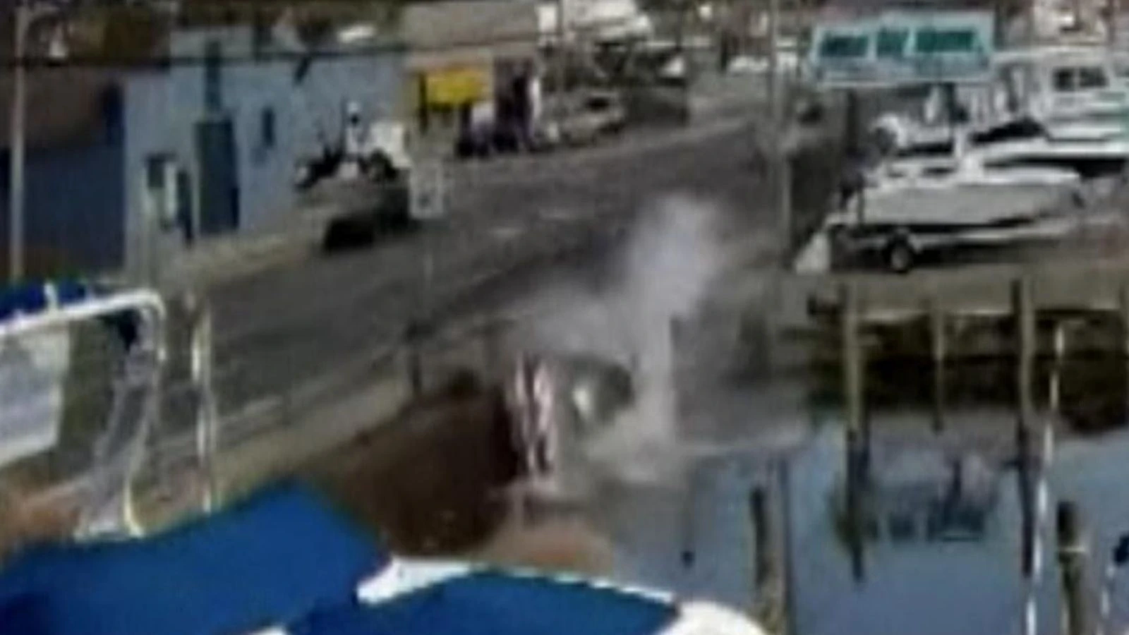 Couple rescued after car plows into canal