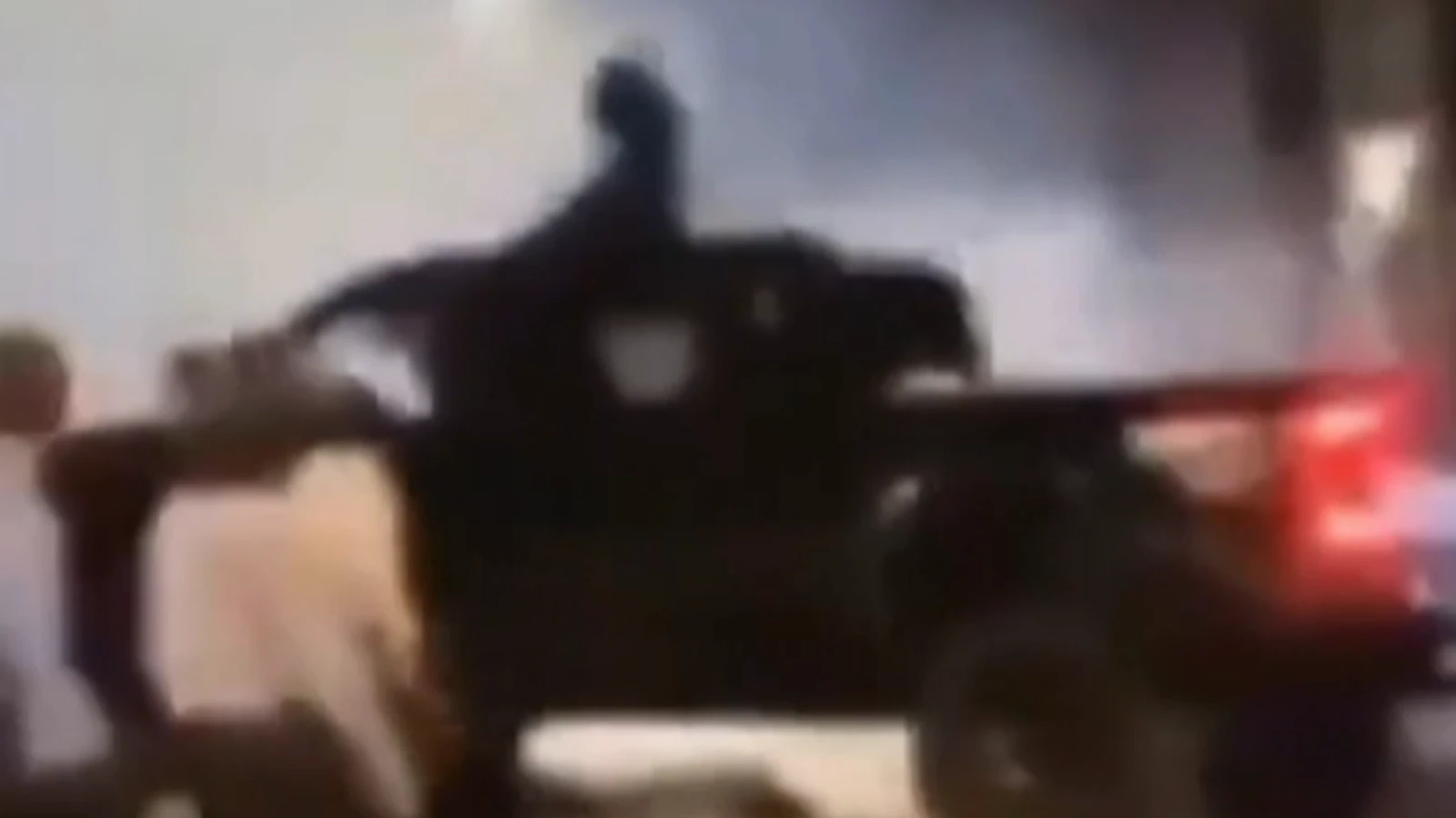 Truck hits cop amid protests over police shooting