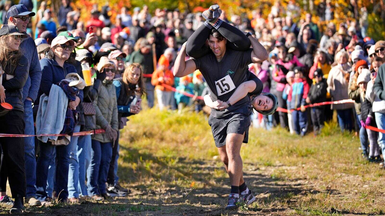 Mud, beer and cash: Annual wife-carrying championship takes Maine by storm