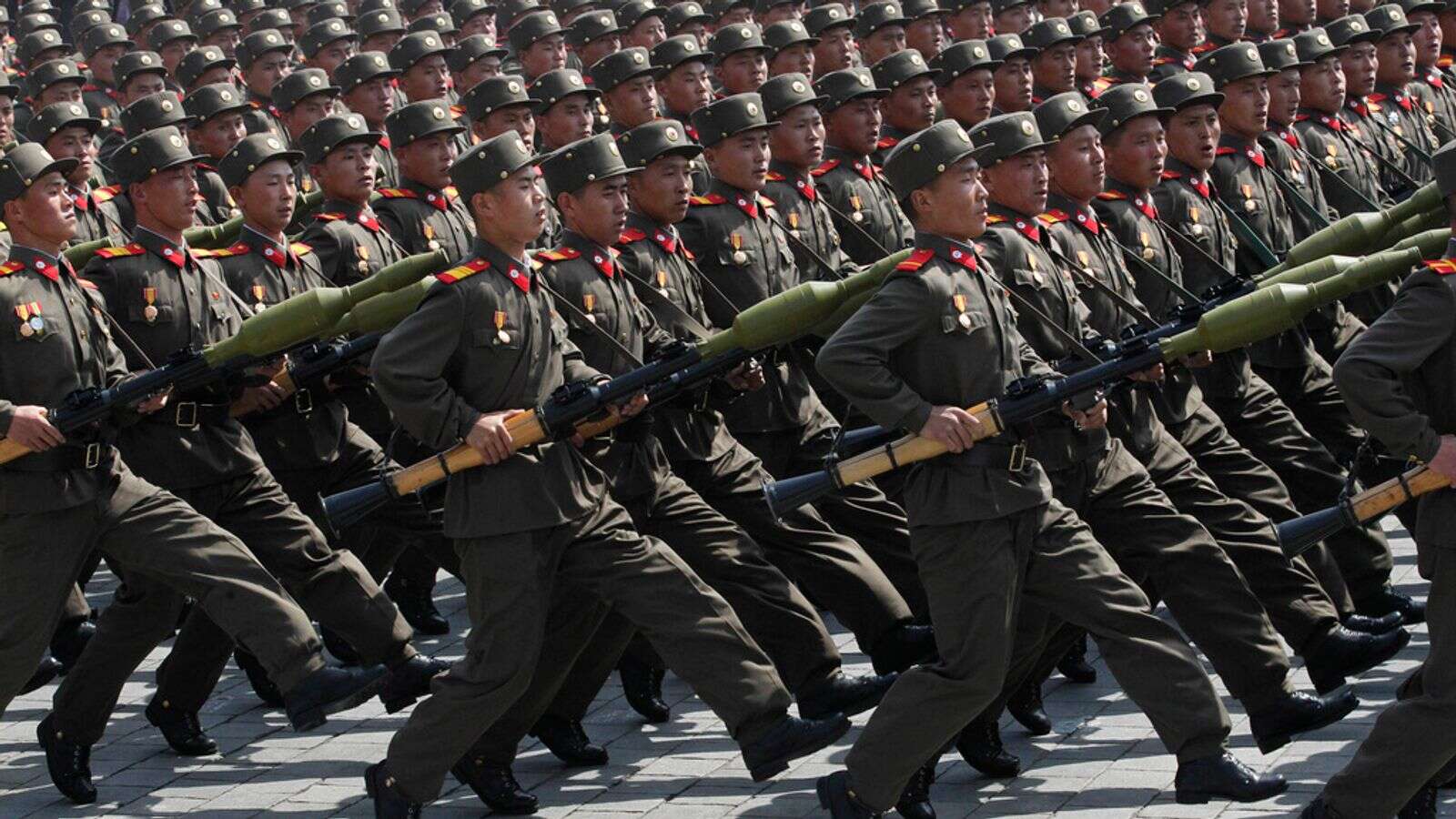 North Korea 'deploys 12,000 soldiers' to support Putin's war in Ukraine - with troops 'given fake Russian IDs'