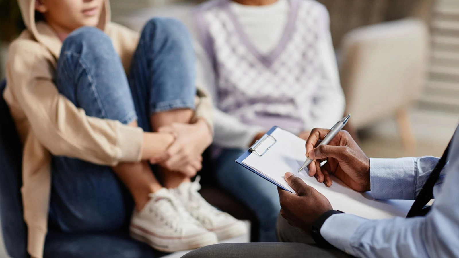 Government cuts therapy funding for adopted children