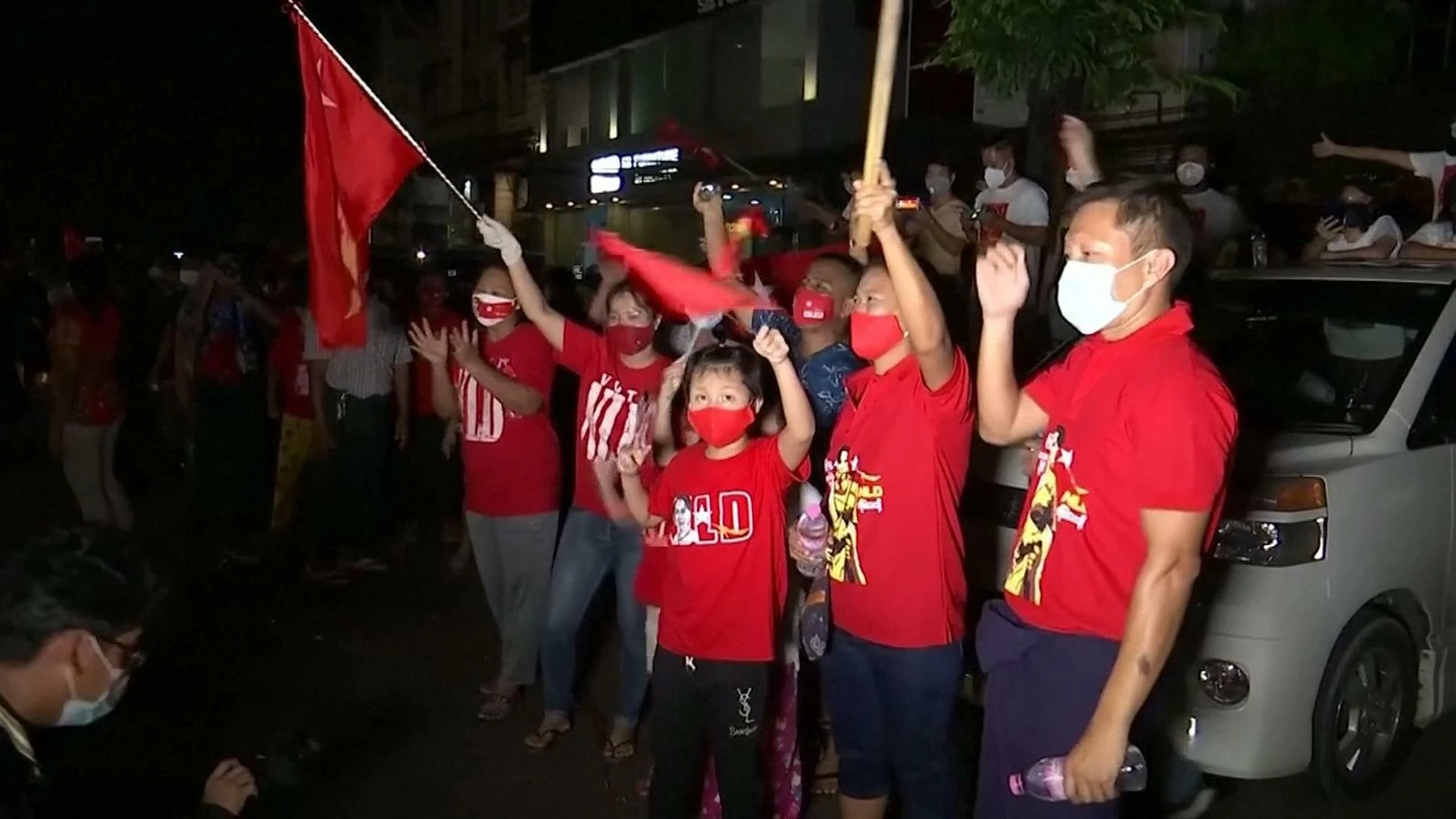 Supporters of Myanmar's leader celebrate early