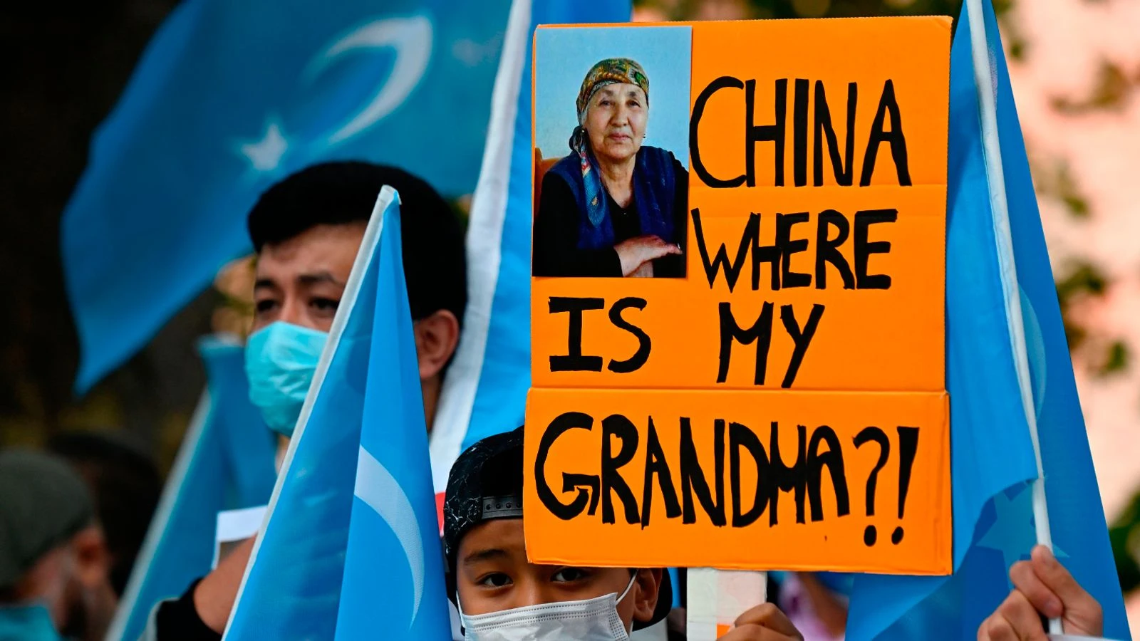 Abbott apologises for joining event with Chinese human rights abuse denier