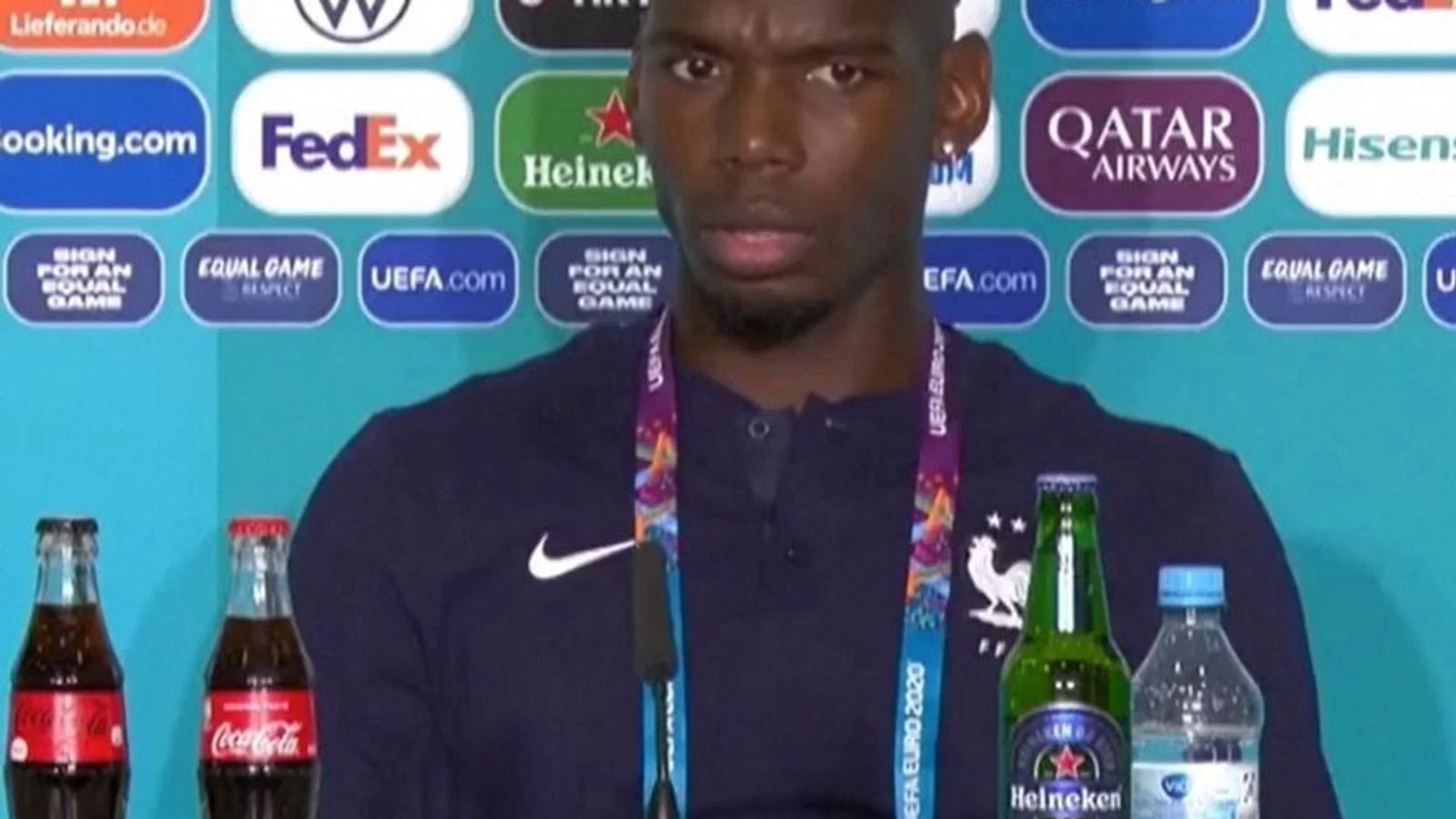 Pogba eyes beer bottle before removing it