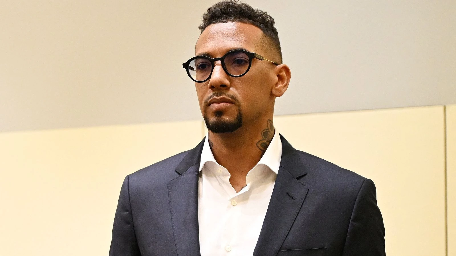 Backlash over star defender's club return after conviction for assaulting girlfriend
